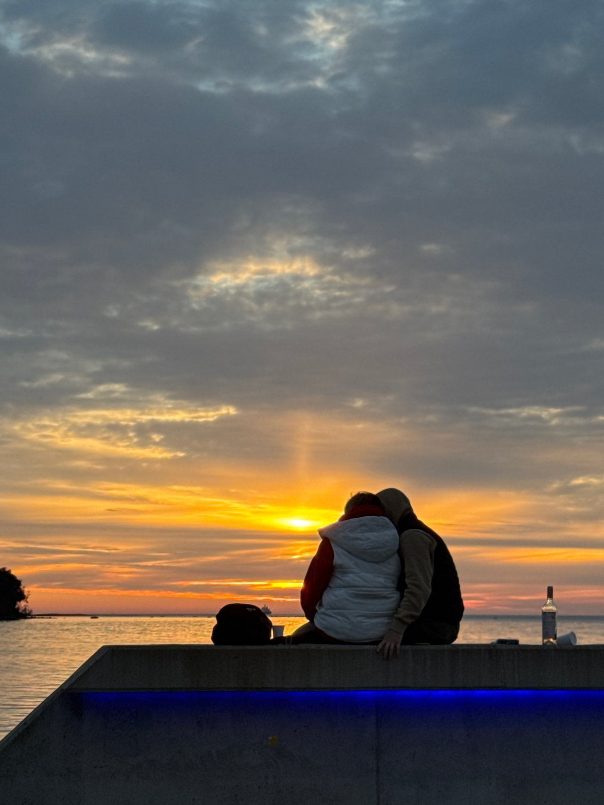 Couple enjoys romantic sunset evening along Tallinn waterfront