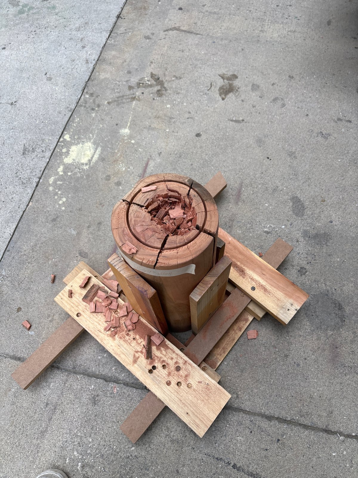 Woodworking materials scattered on Mexico City concrete surface