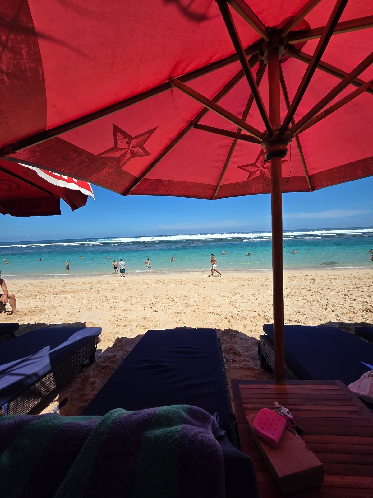 Early morning beach activity documented in Kuta Selatan, Indonesia