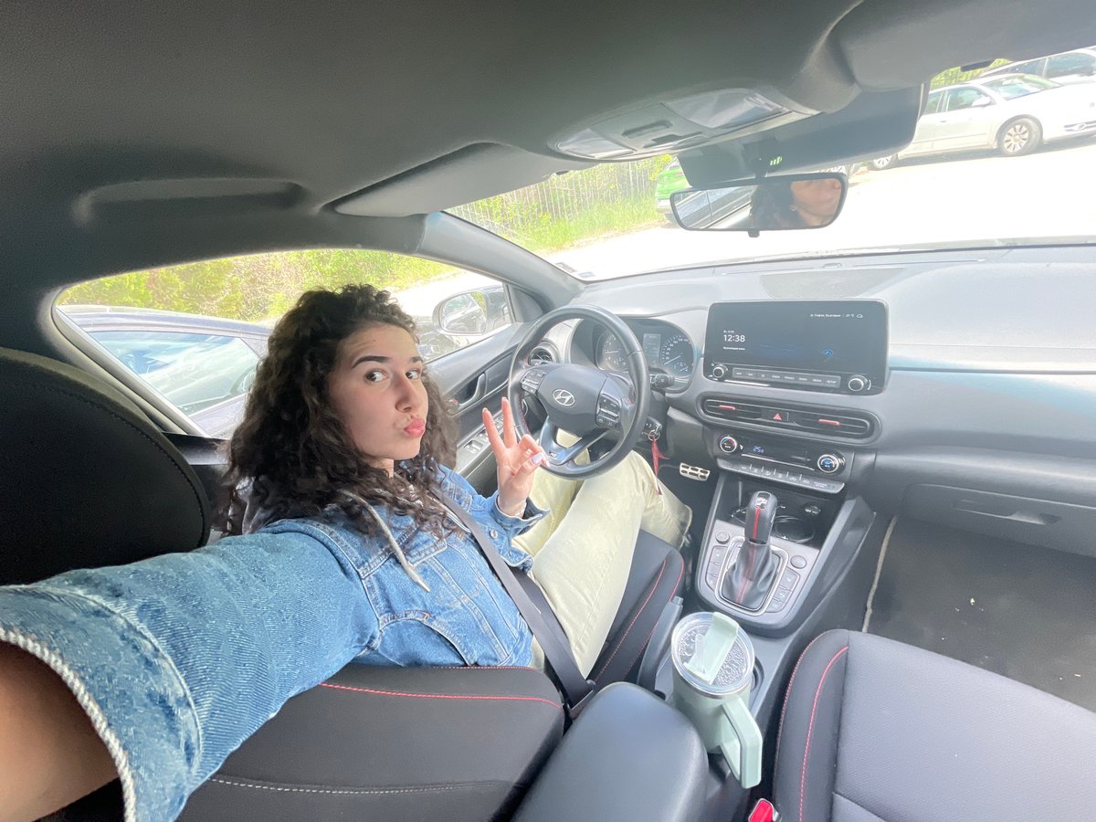 Woman takes selfies in car in Sofia Bulgaria