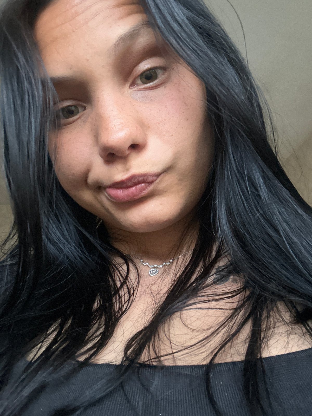 Woman photographed wearing heart necklace in Sofia