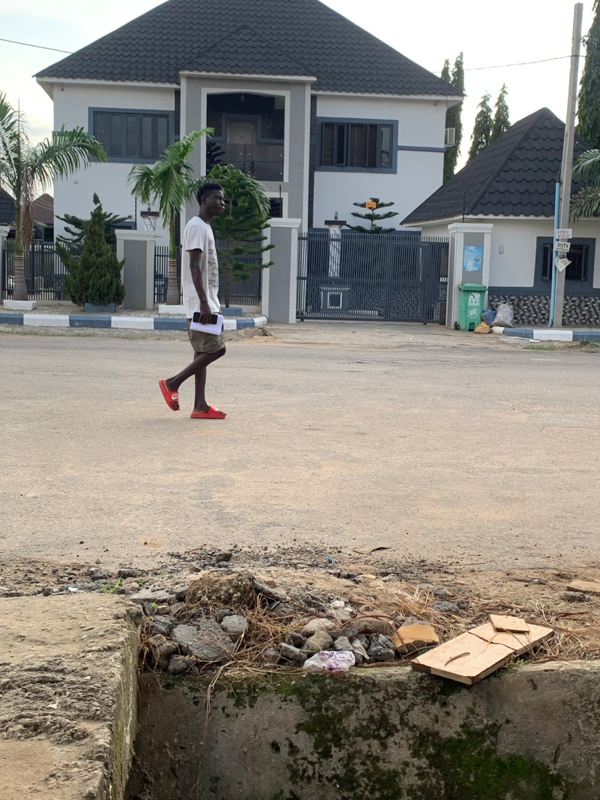 Everyday street life in a residential Abuja neighborhood