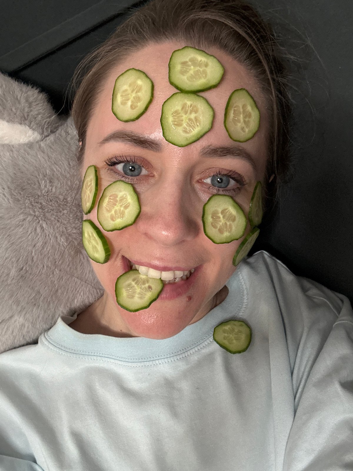 Woman enjoys cucumber facial treatment in Chaikovsky, Russia