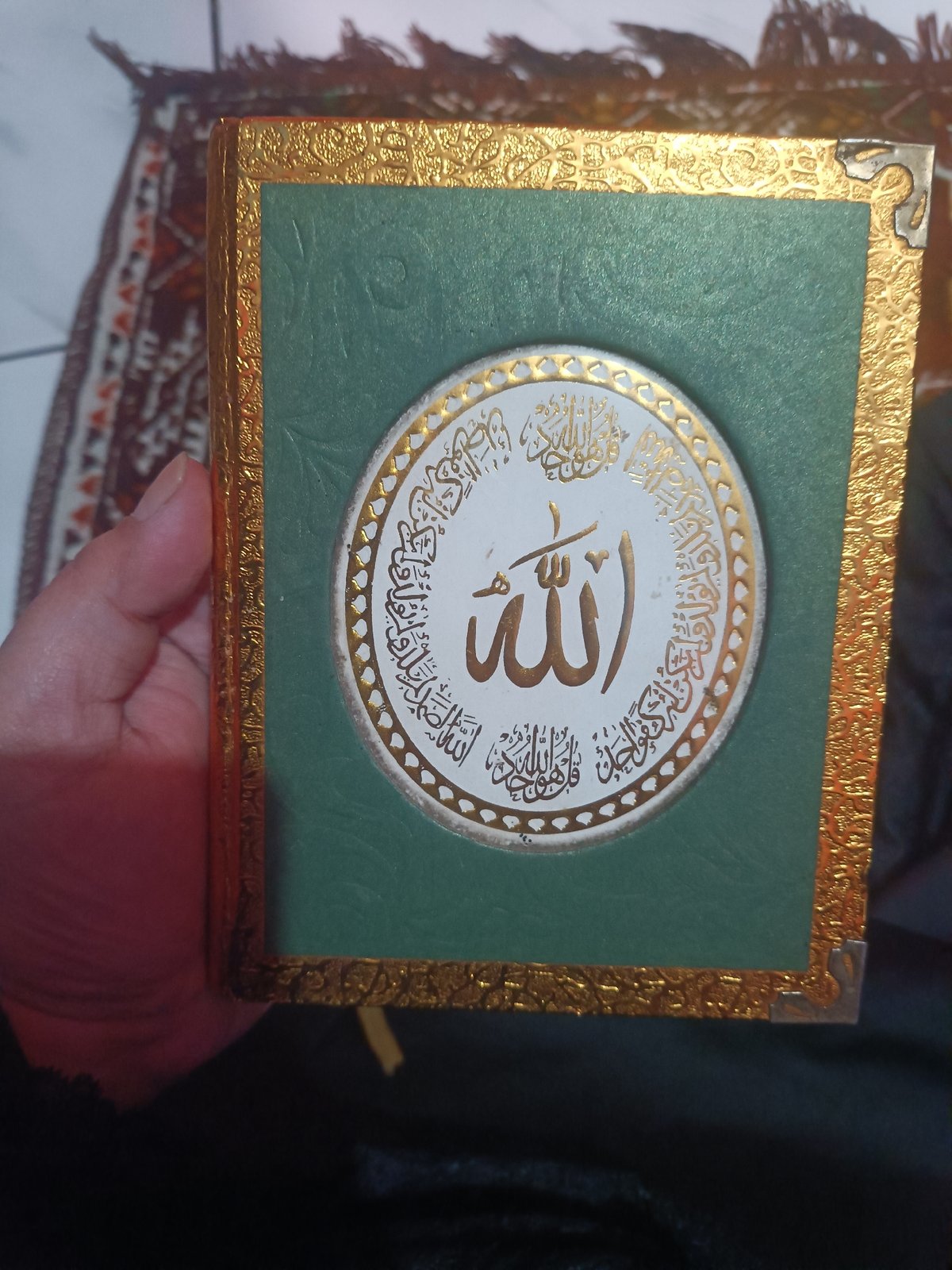 Selfie series in Depok featuring a decorative Quran