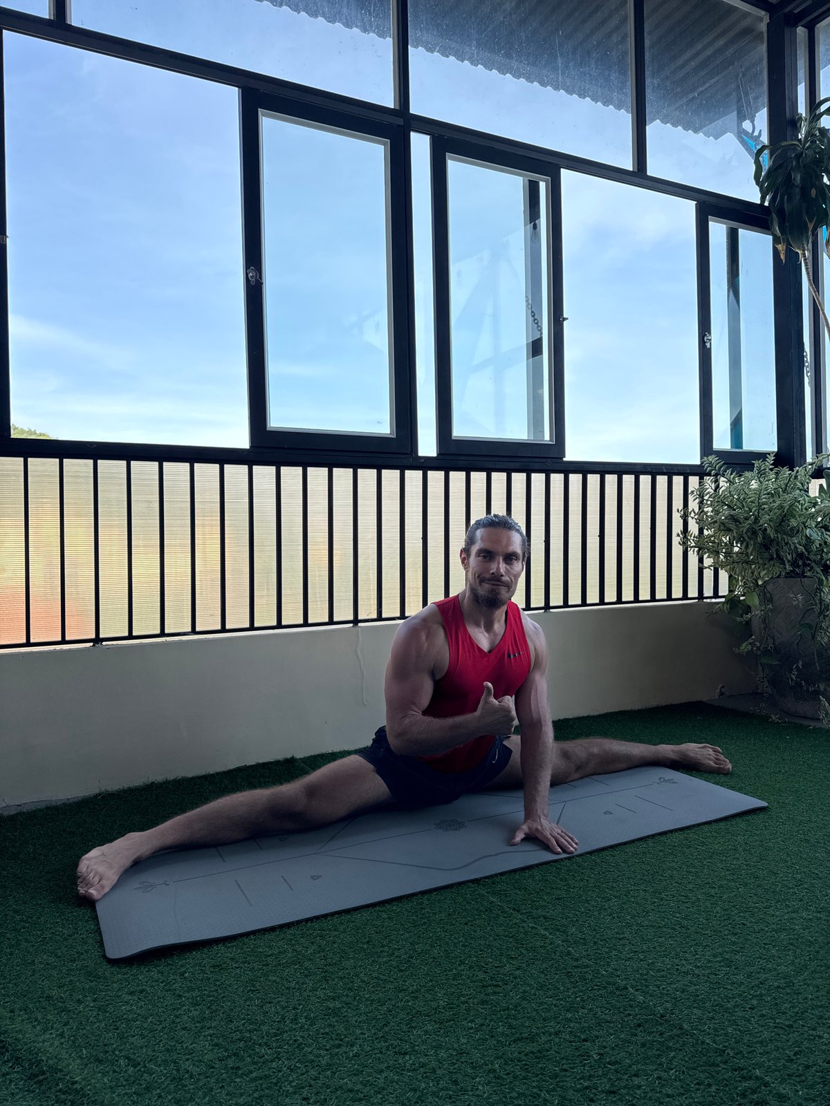 Morning yoga session captured on Nha Trang balcony
