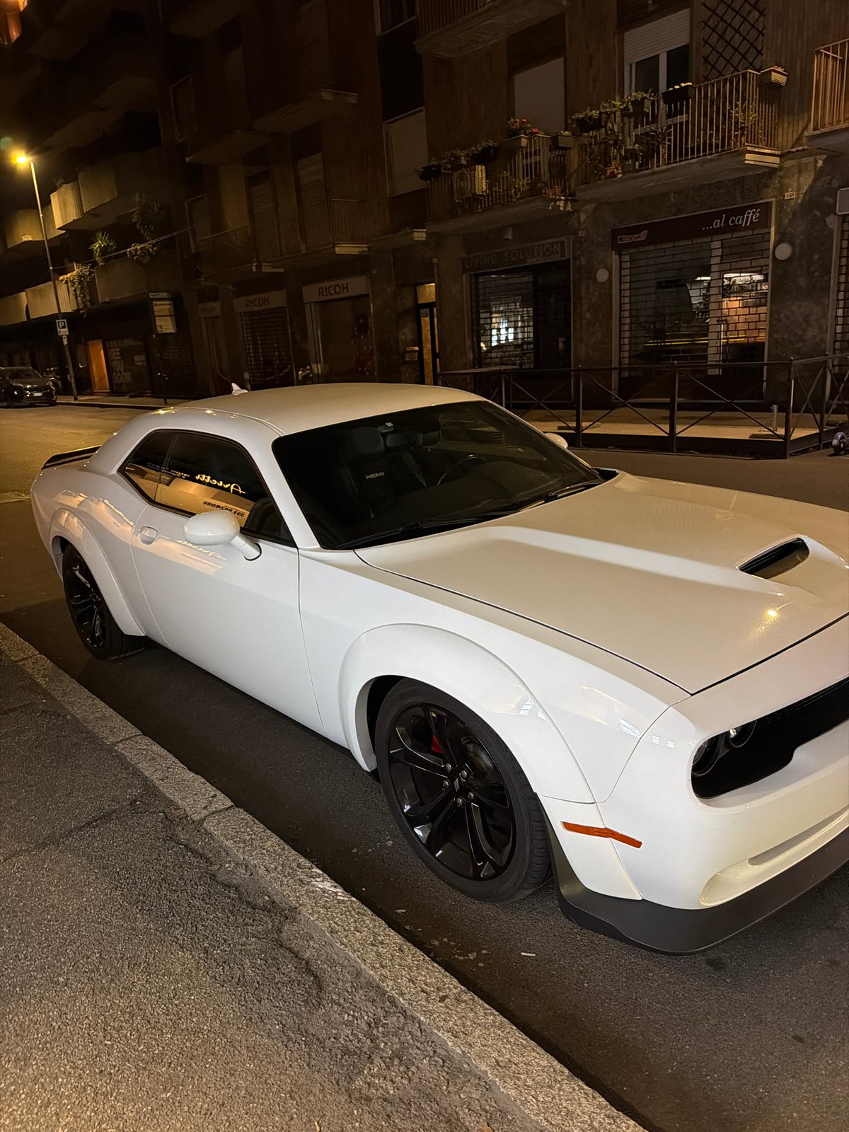 White Dodge Challenger and MV Agusta spotted on a Novara night