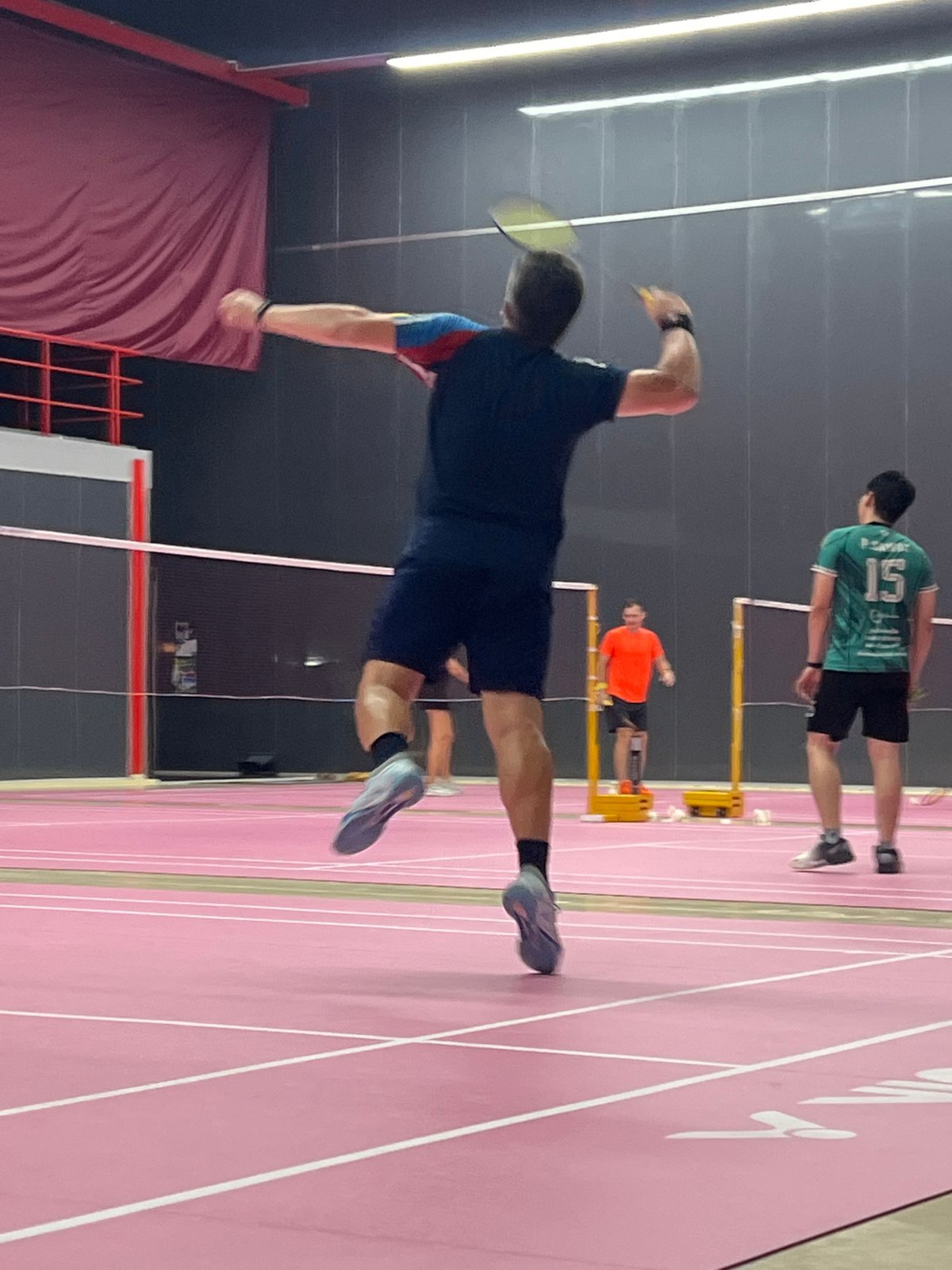 Badminton session on Ko Samui's pink indoor court