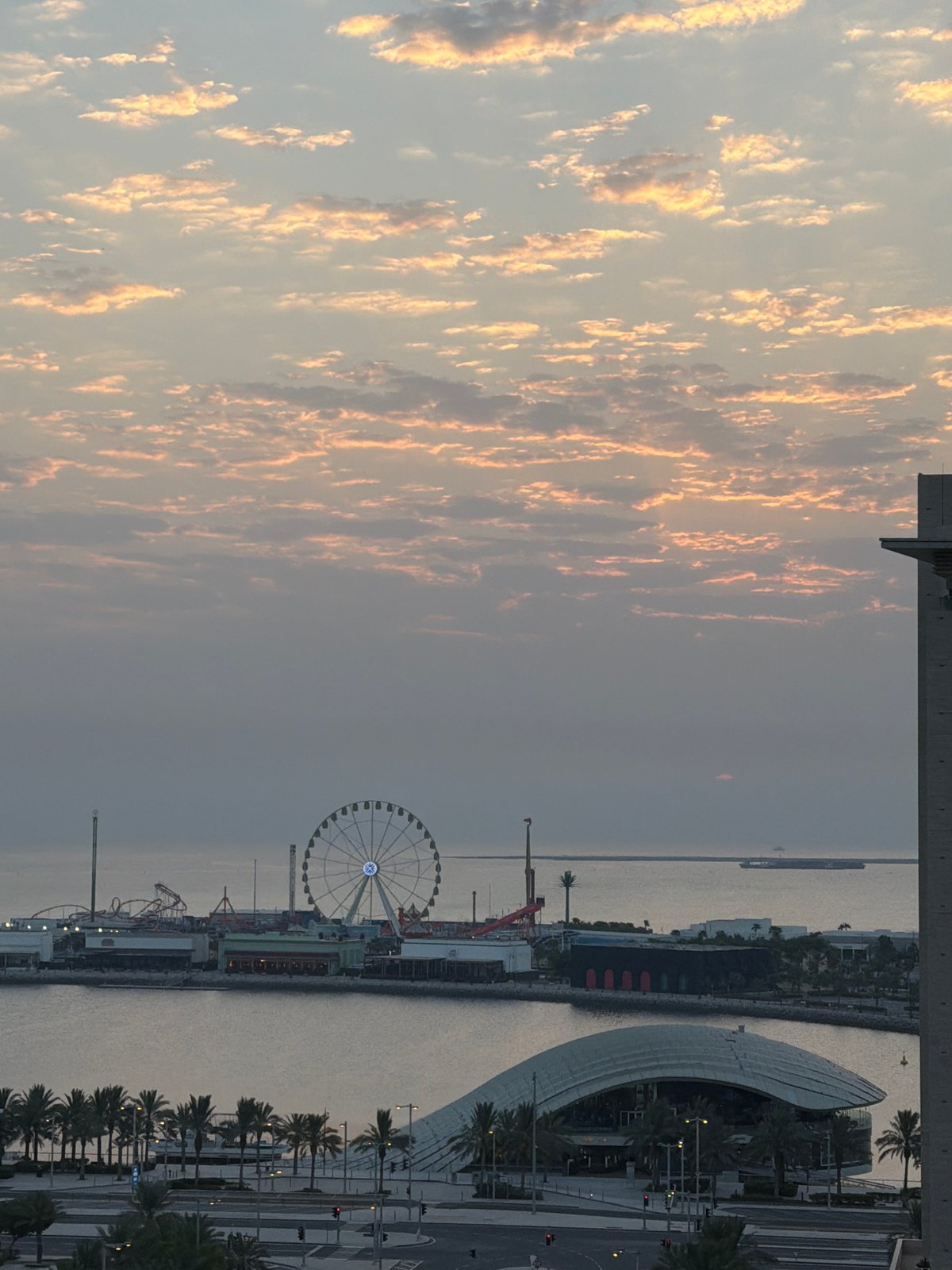 Lusail waterfront glows at dusk, multiple angles