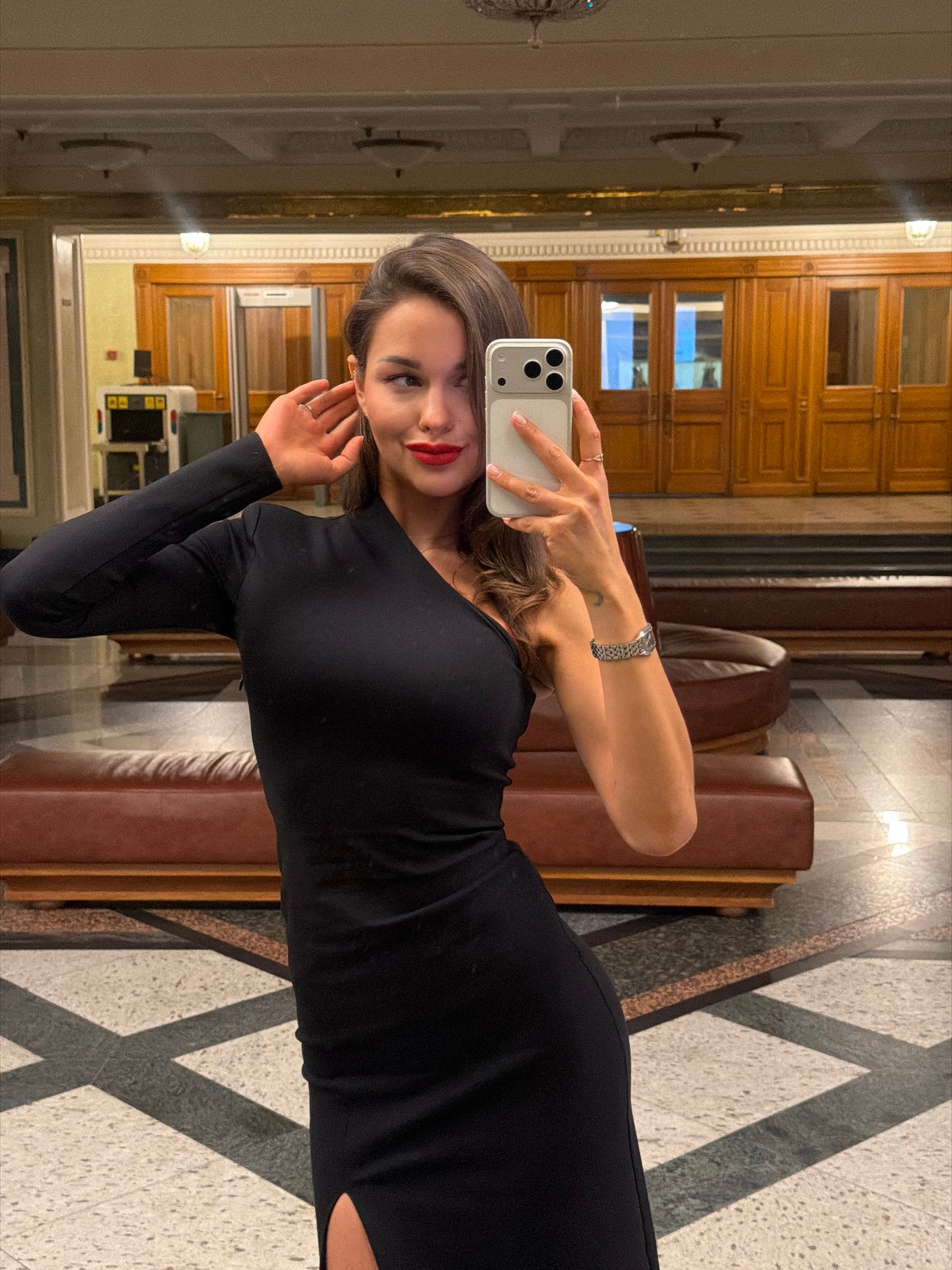 Woman takes selfies in Moscow hotel lobby and car