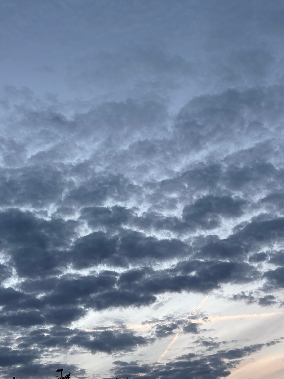 Dramatic midsummer skies over Hvidovre, caught from windows and rooftops