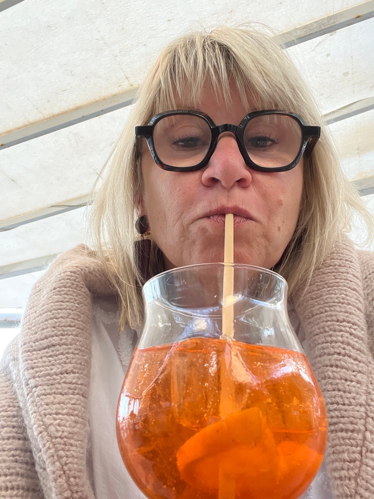Two women captured in casual moments in French coastal town