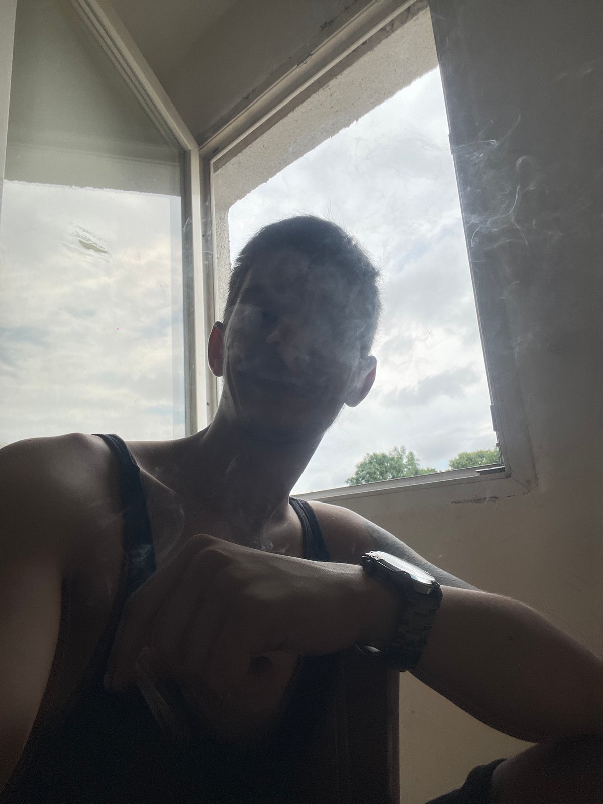 Chilling indoors with smokes, beers, and a Monster Energy