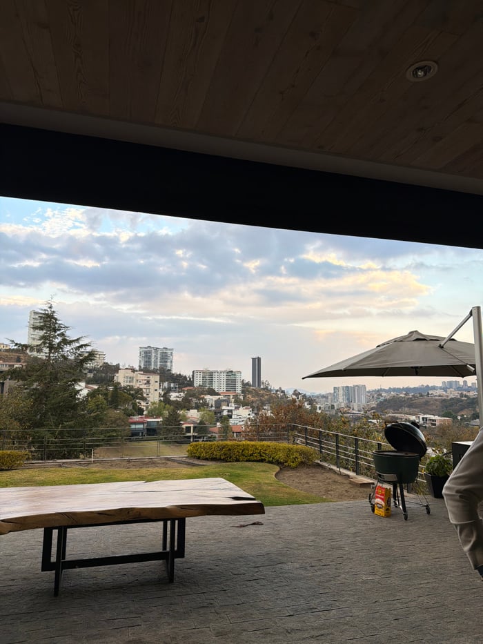 Evening social gathering captured in Interlomas venue with city views