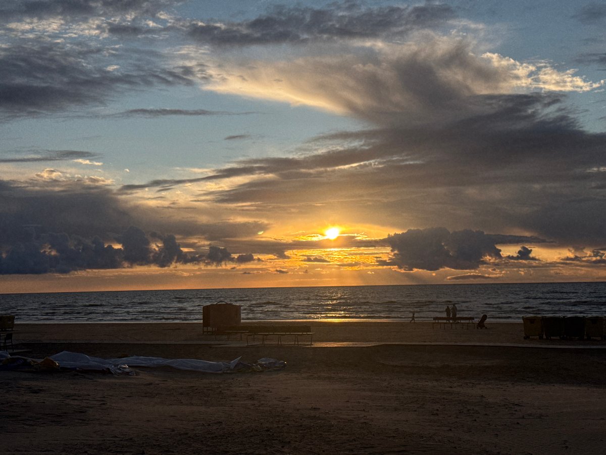 Golden sunset over a sandy Riga beach