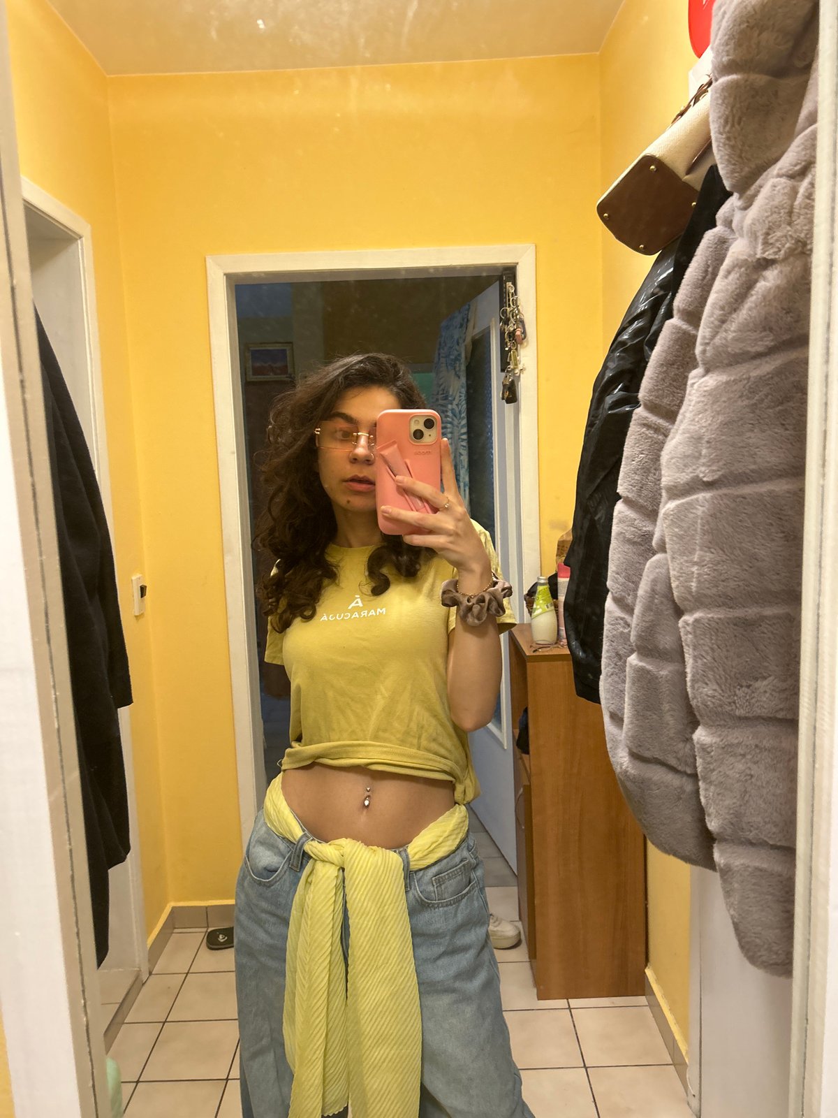 Woman Takes Mirror Selfies in Yellow Outfit, Sofia