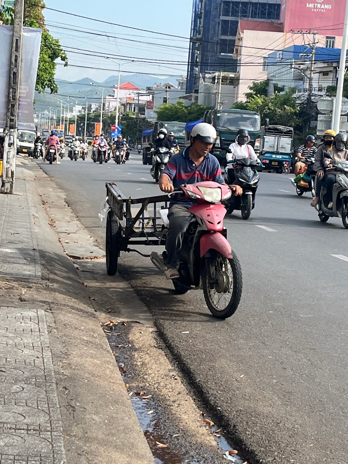 Late-night motorcycle repair work observed in Bac Nha Trang