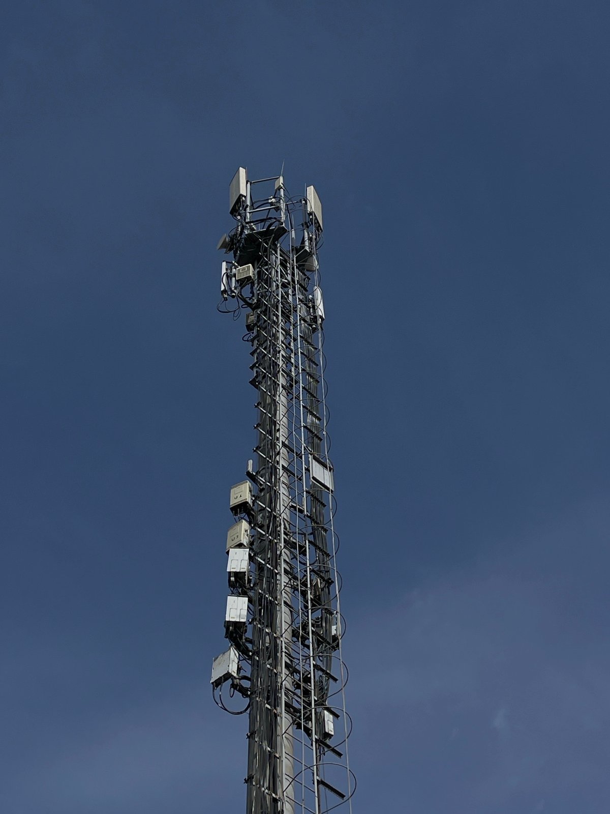 Morning scenes captured in Krasnoyarsk: communication tower, vehicle servicing