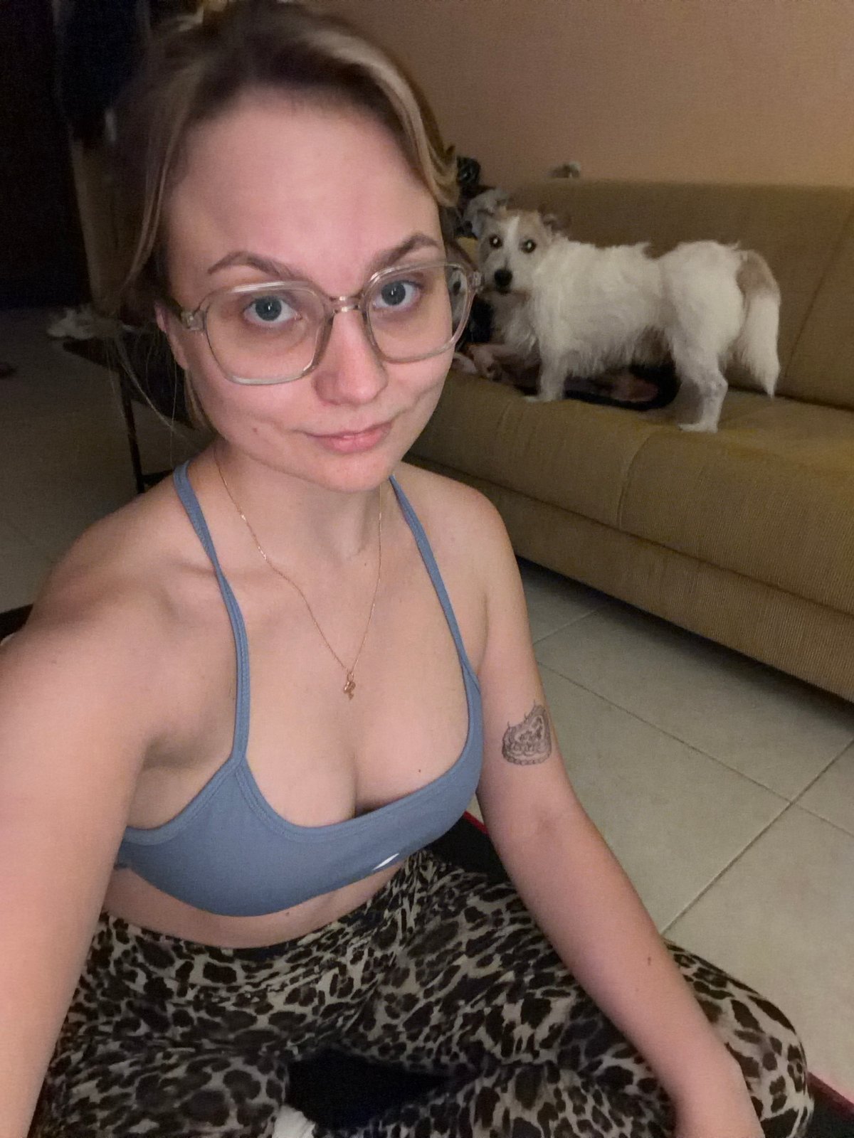 Woman completes home workout session in Tel Aviv apartment
