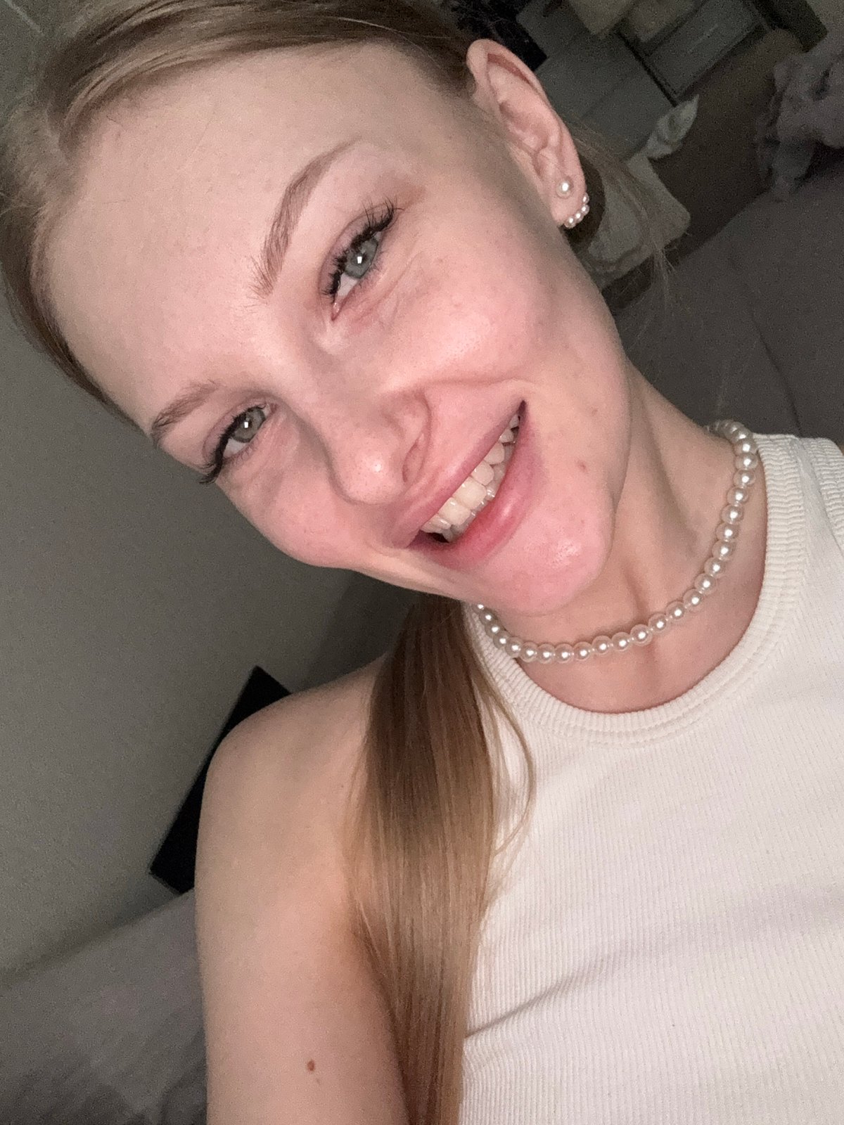 Woman takes multiple selfies in various angles in Perm
