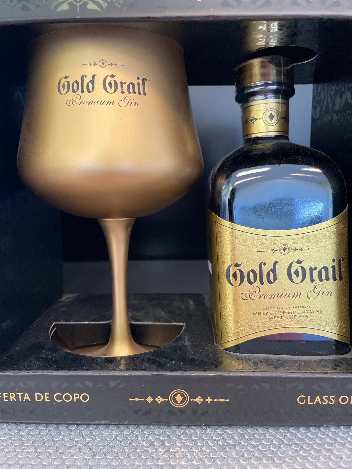 Premium liquor display includes gin gift set, tequila cream bottles