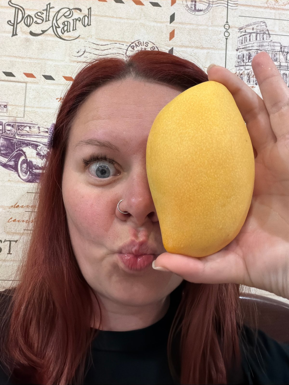 Woman prepares mango dessert in Chaikovsky, Russia