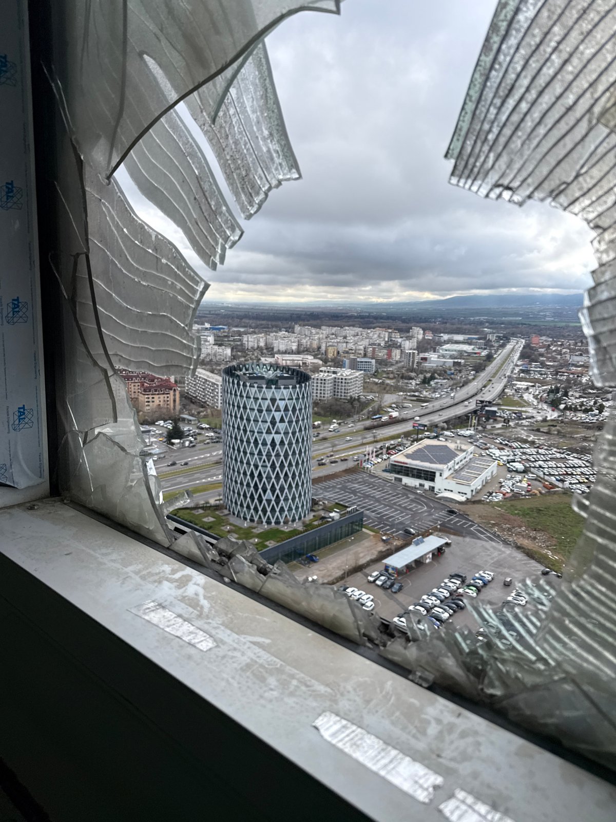 Morning documentation of Sofia landmarks includes damaged window view