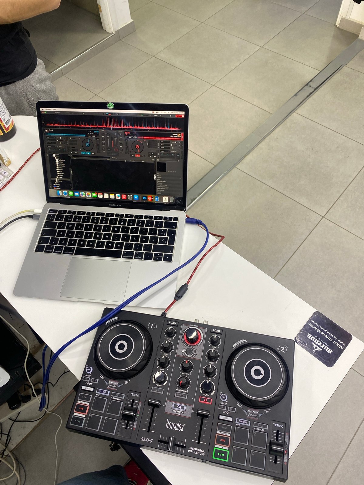 DJ equipment setup observed at Ushuaia barbershop location