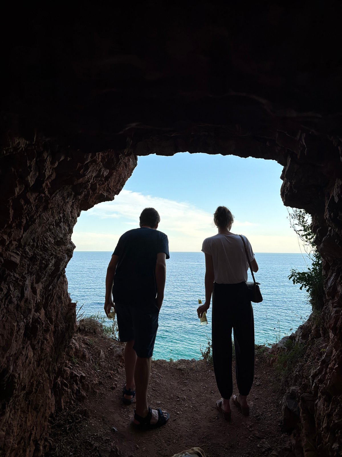 Exploring a sea cave and coastal overlook in Petrovac, Montenegro