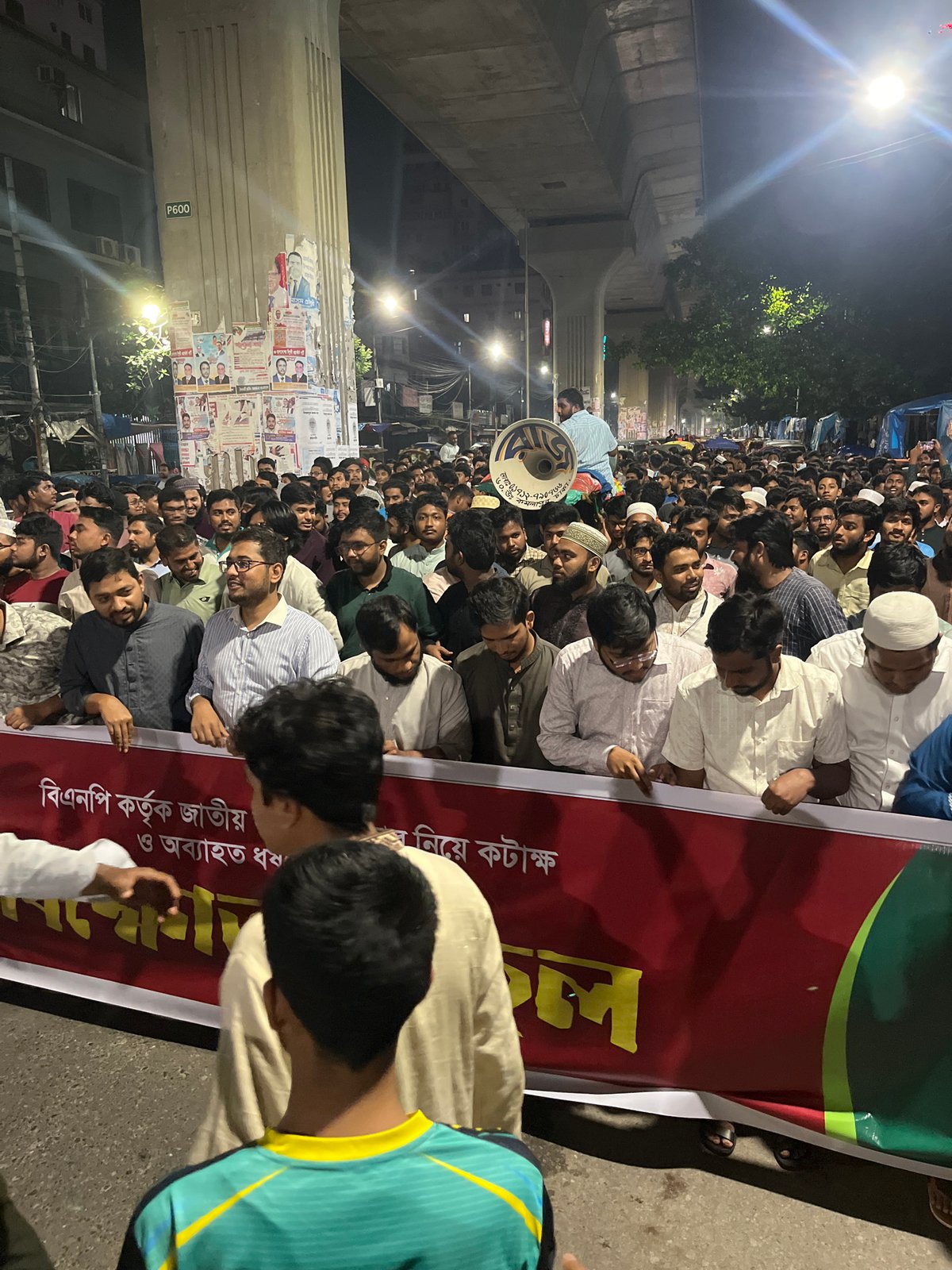 Political rally with revolution banners in Dhaka streets