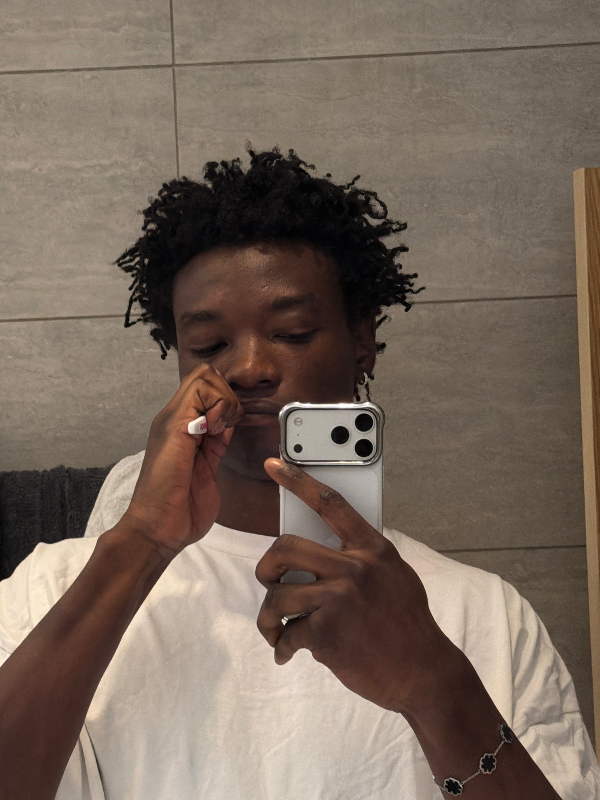Young men capture casual selfies across London locations