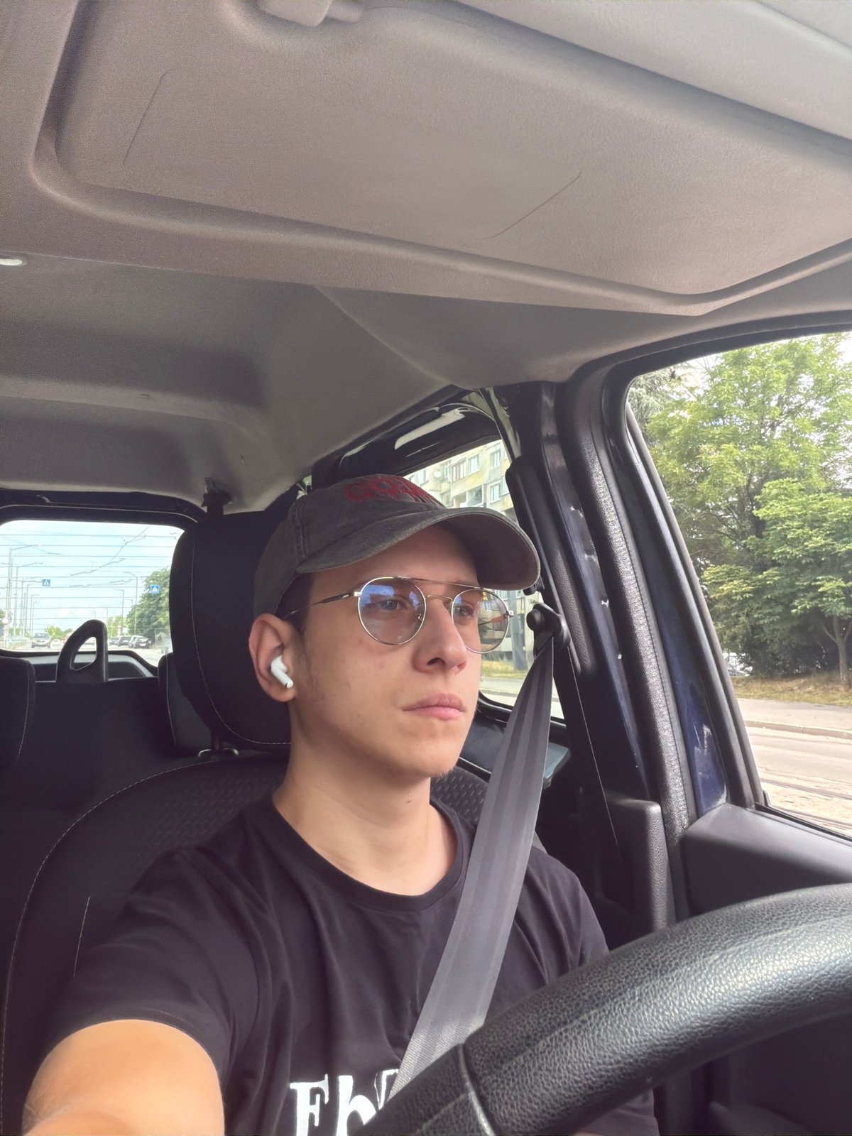 Driving through Sofia with AirPods in on a July morning