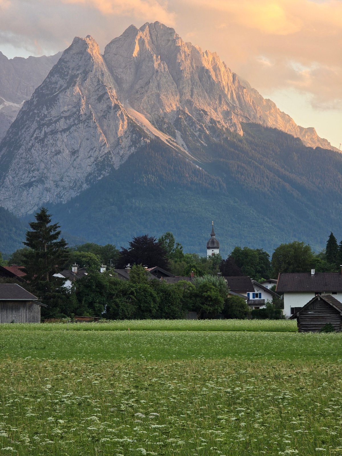 Evening walk through Garmisch-Partenkirchen's Alpine meadows and mountain views