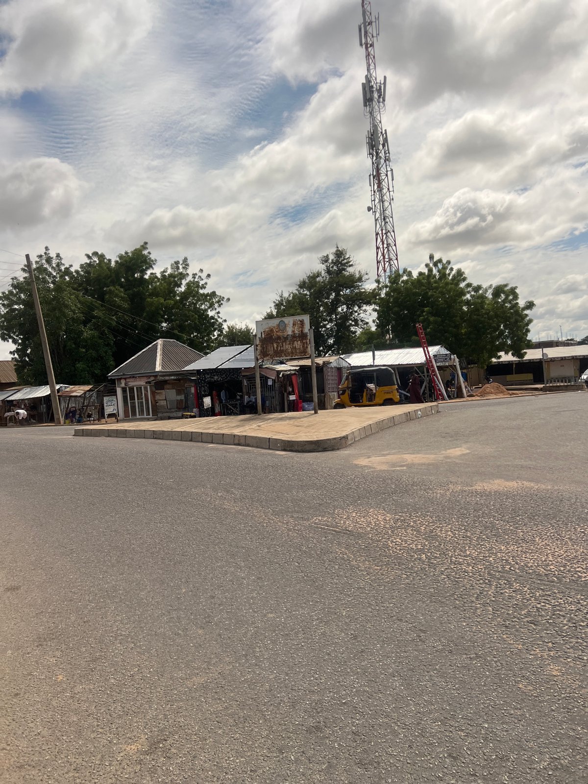 Daily street life documented across Jalingo, Nigeria during midday
