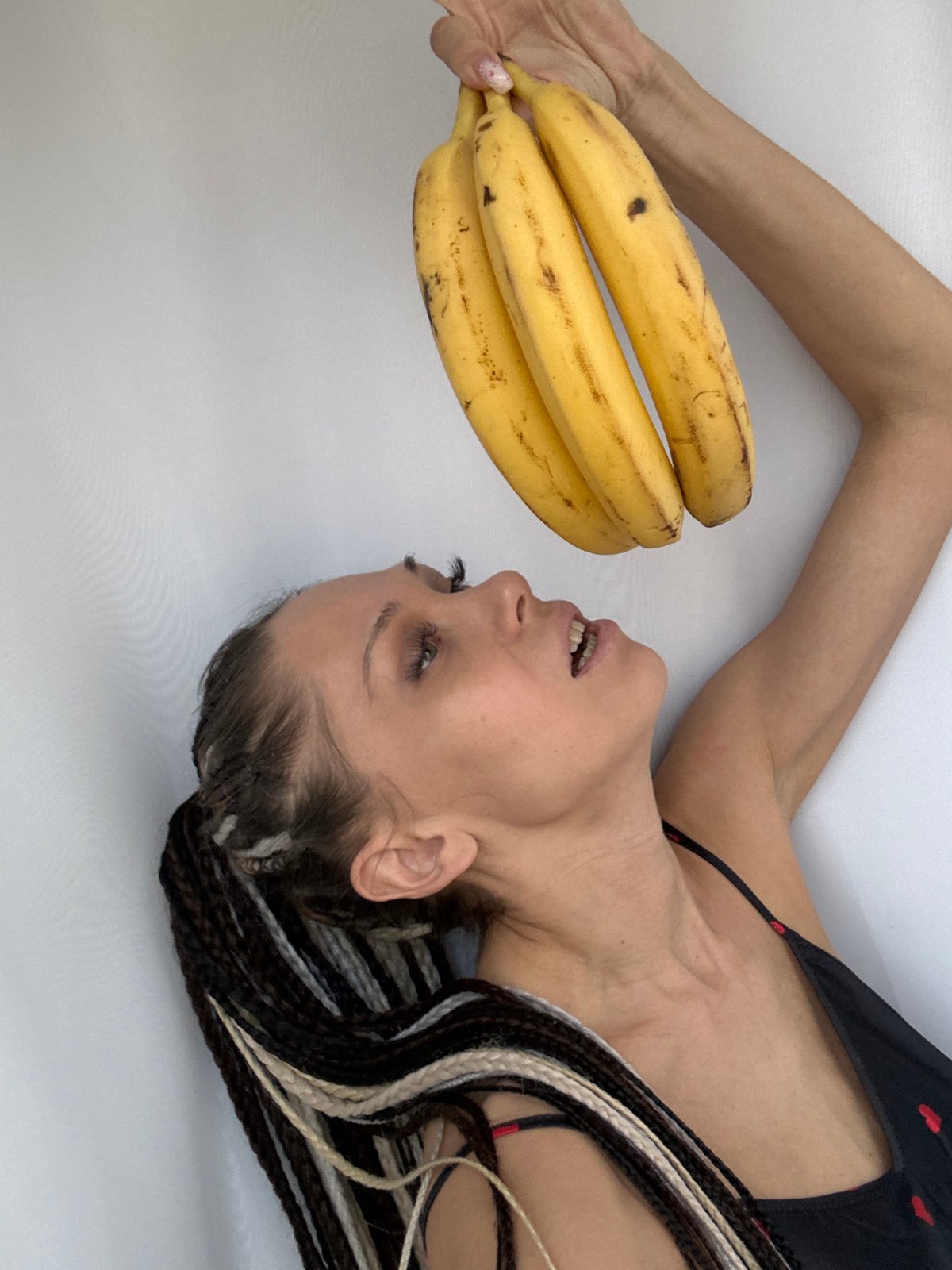 Woman in heart-patterned top photographed in staged poses near Yaroslavl