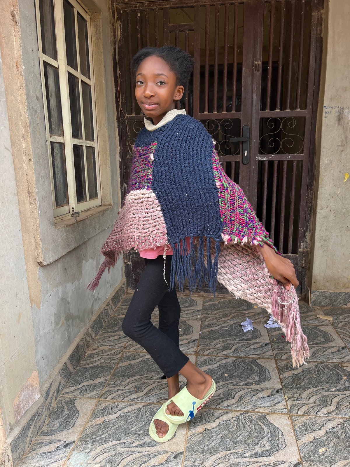 Young girls photographed outside residential buildings Friday morning