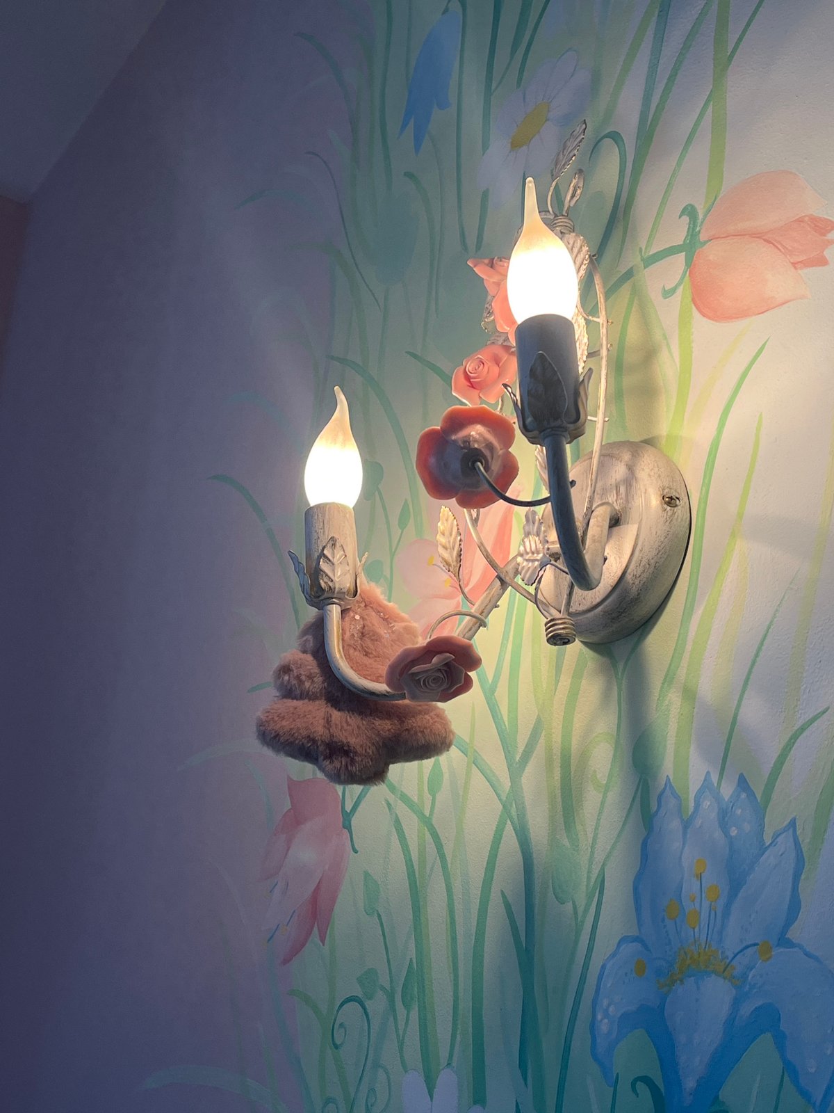 Indoor scenes captured: decorative lighting, perfume bottle, window view