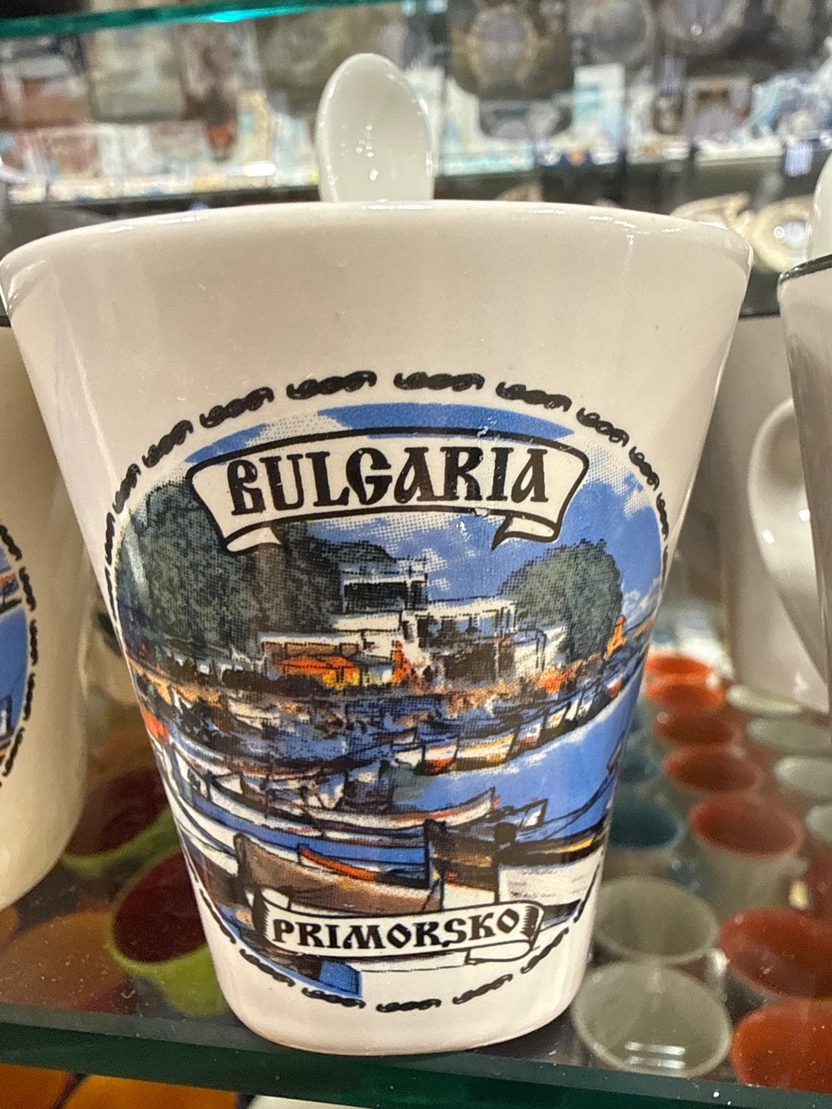 Tourist browses themed souvenirs in Primorsko Bulgaria gift shop