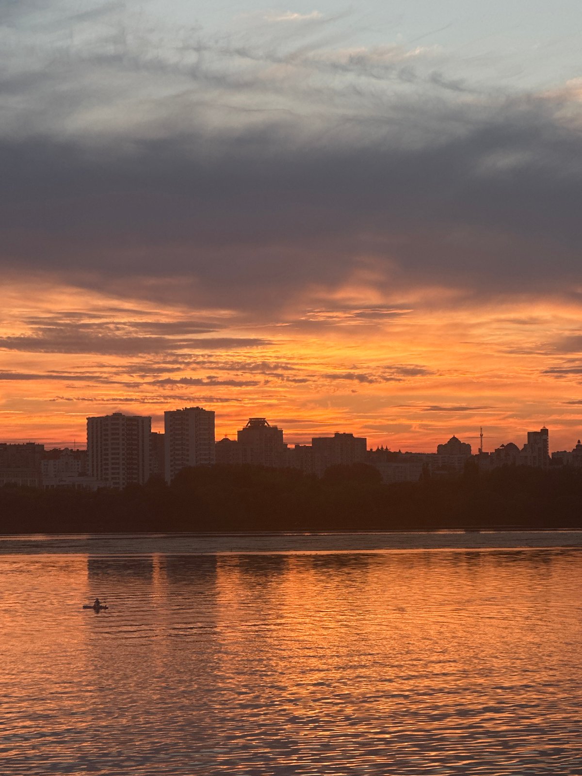 Vivid orange and purple sunset over Lipetsk skyline