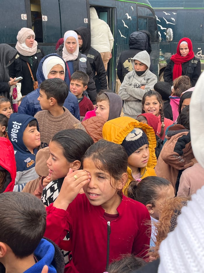 Humanitarian aid distribution draws crowds at Syrian refugee camps