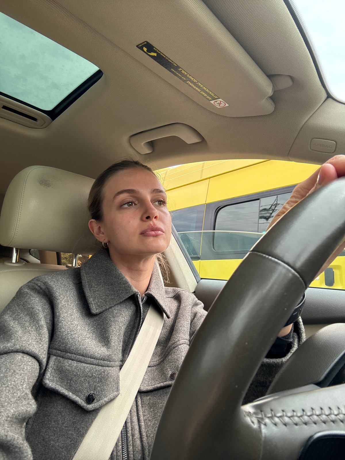 Woman documents morning routine through selfies in Tbilisi