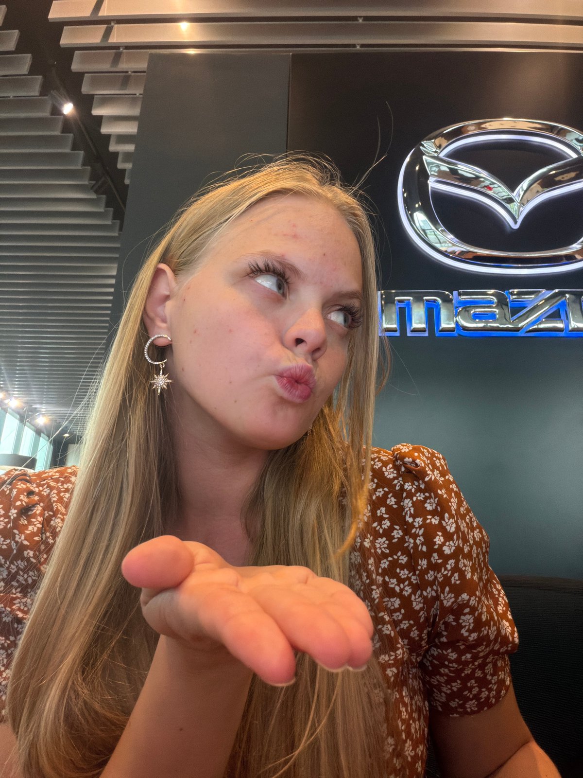 Afternoon selfie session inside an Izhevsk car dealership showroom