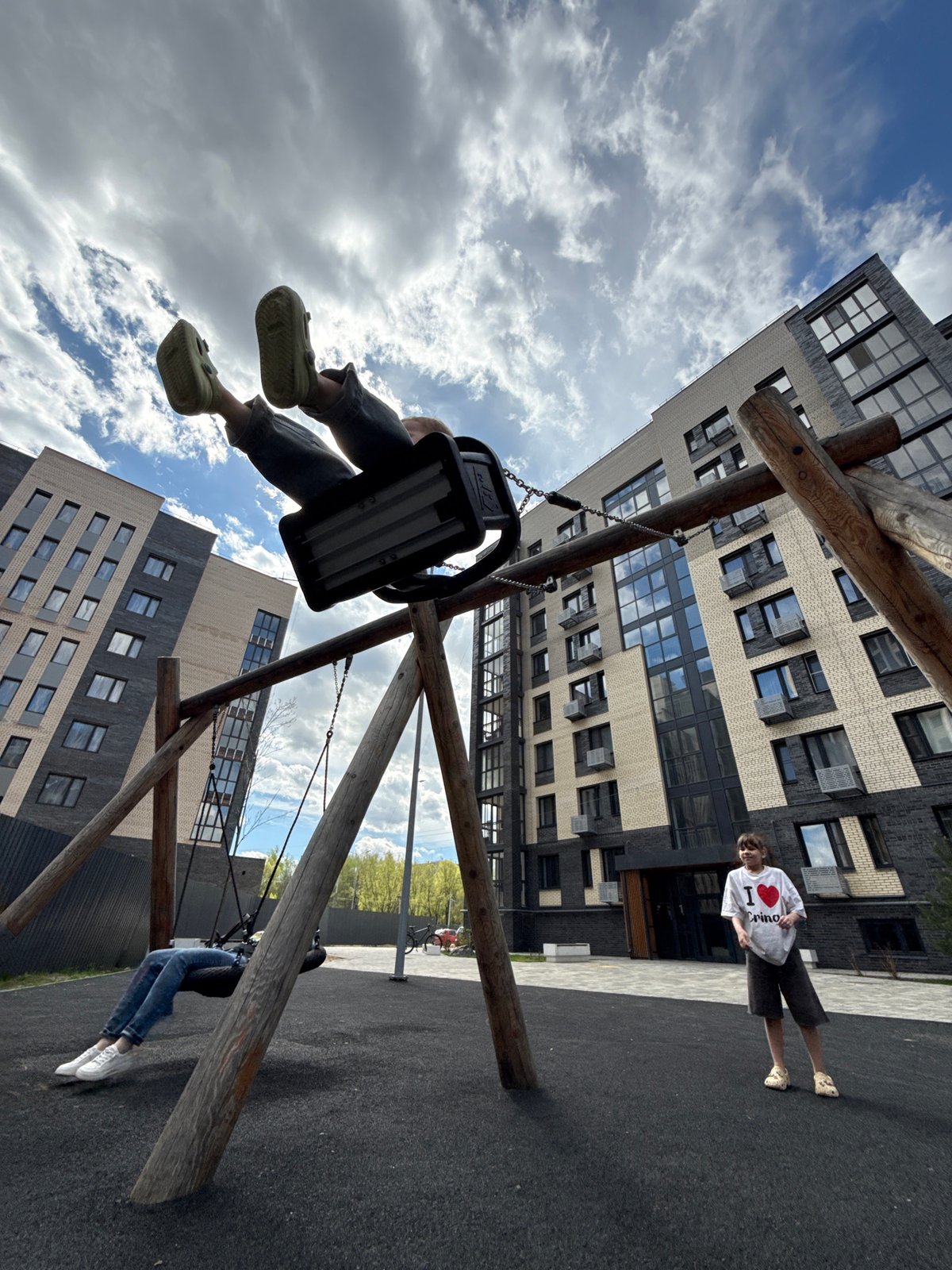 Morning playground activity in Rusanovo draws children and families