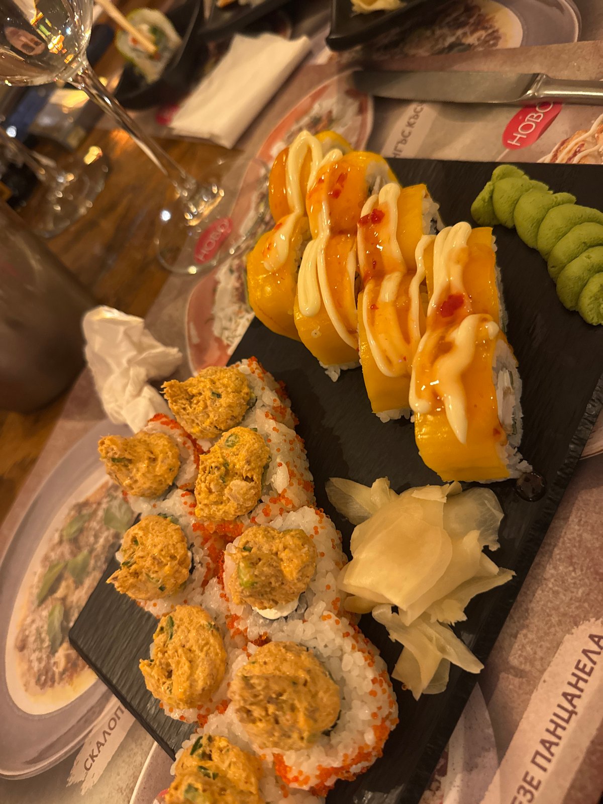 Two men share sushi dinner at Bansko restaurant