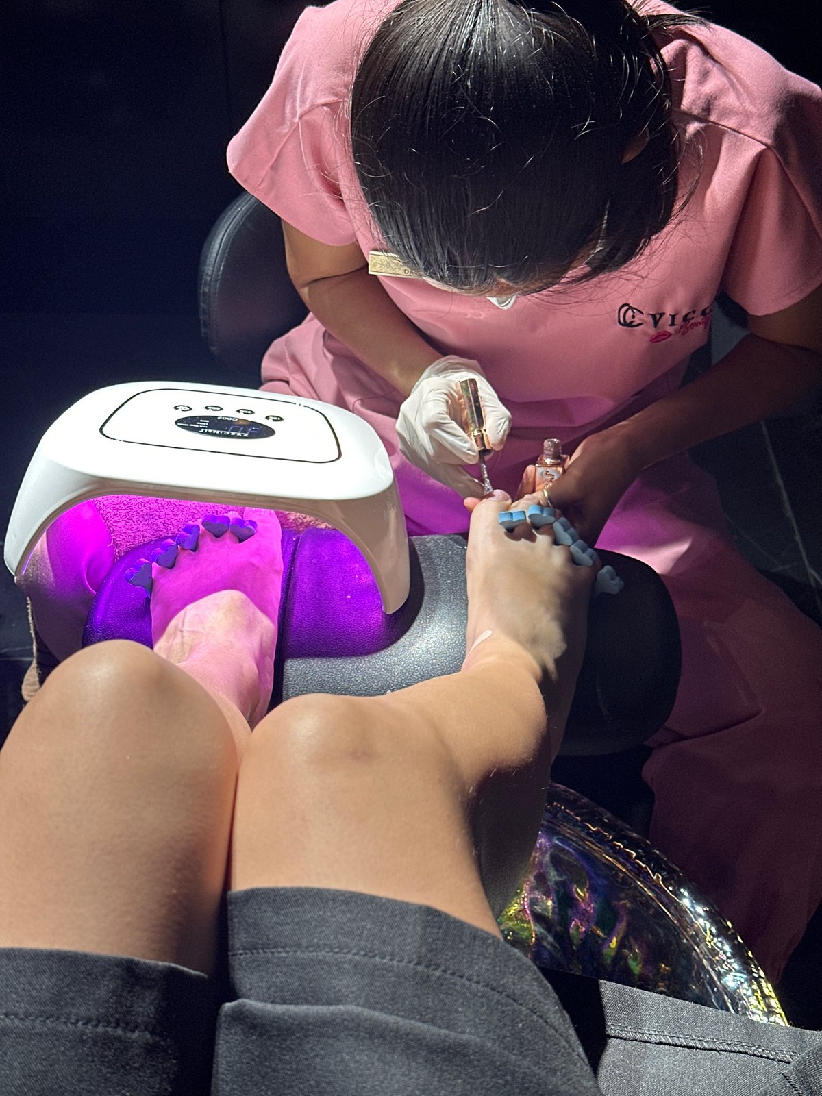 Nail salon session in Phnom Penh with moody LED lighting