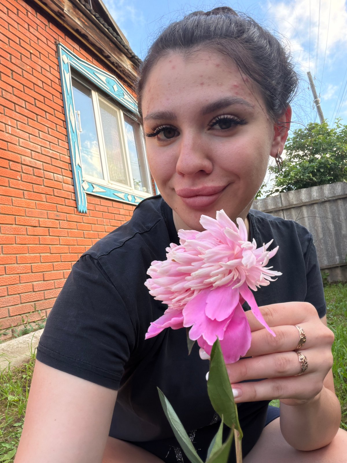 Lazy summer afternoon in a Russian backyard with peonies