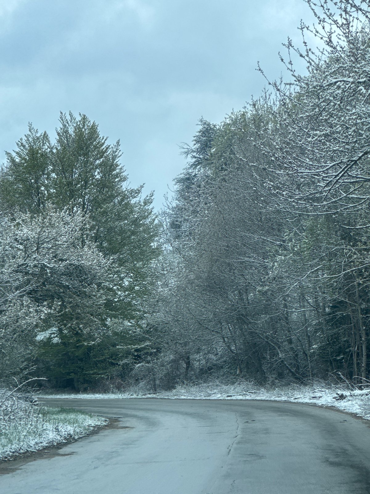 Late spring snowfall covers roads in Chokmanovo, Bulgaria