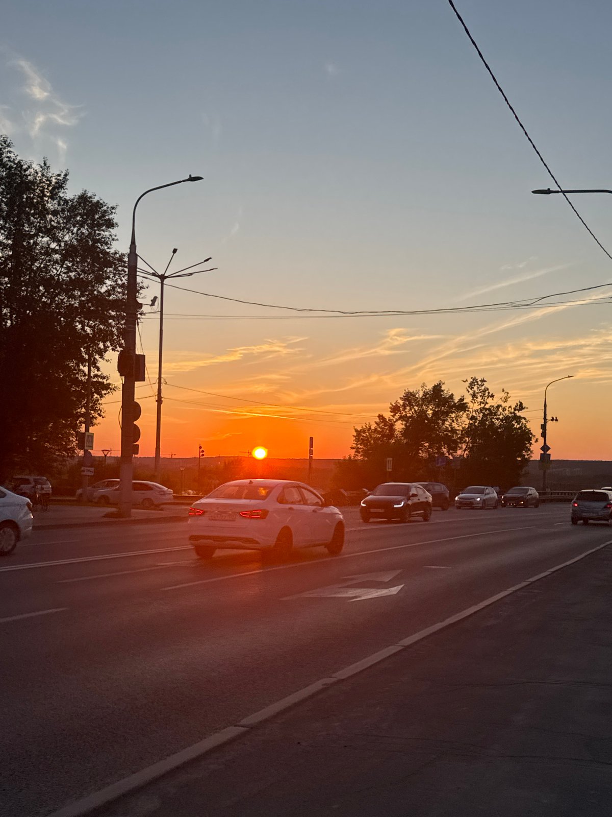 Golden hour along the Perm embankment, summer evening