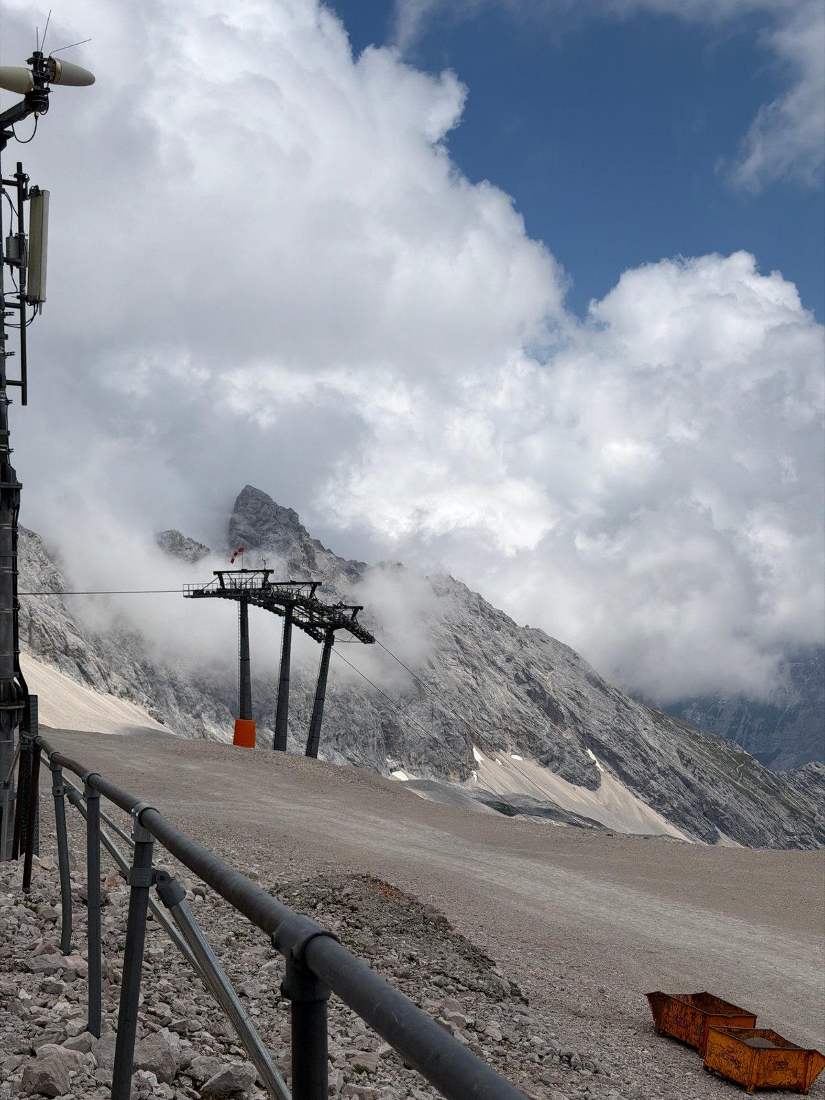 Snow groomers and heavy equipment at a Garmisch-Partenkirchen mountain site