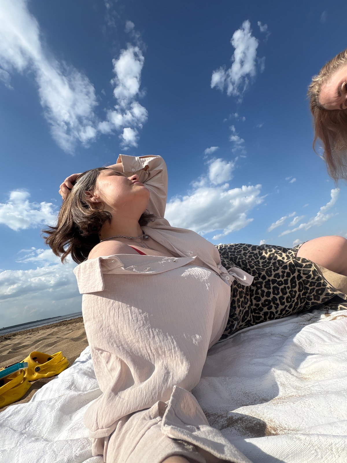 Women enjoy beach day in Chaikovsky, Russia