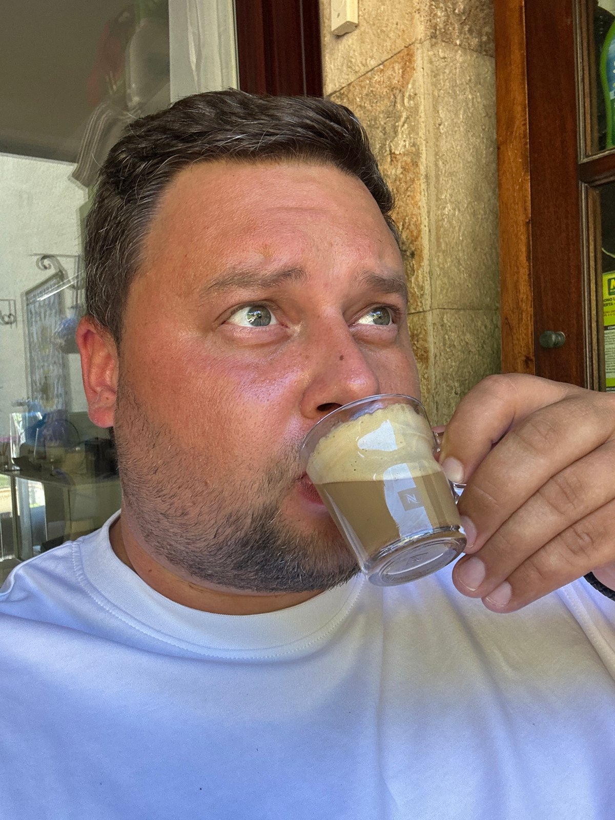 Man enjoys coffee and squid lunch in Sant Feliu de Guíxols